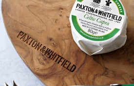 celtic carpa goats cheese on a paxton and whitfield wooden cheeseboard with cheese knife