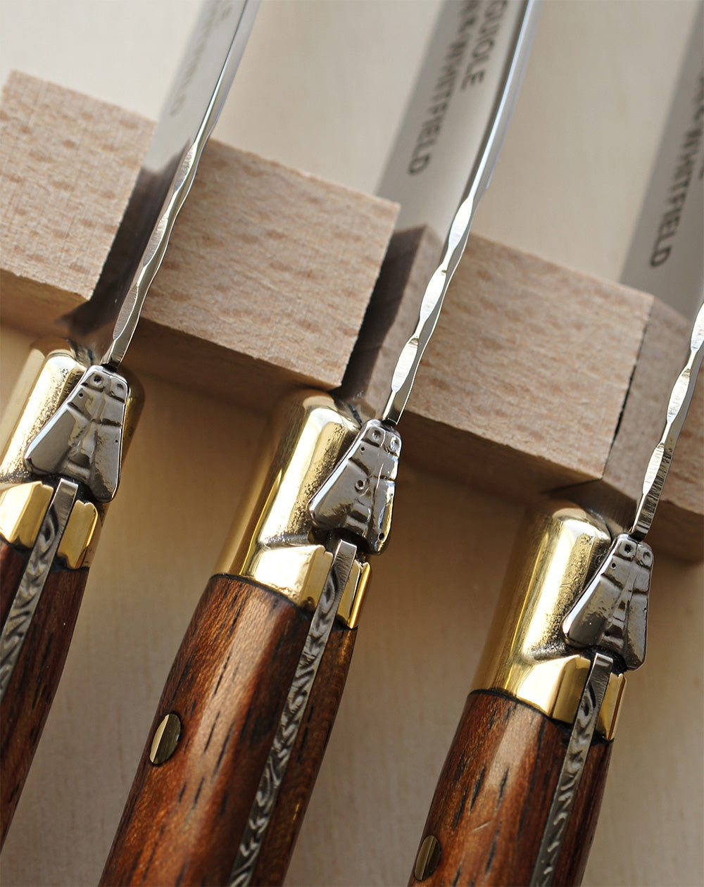 detail close up of paxton and whitfield wood 7 piece knife set