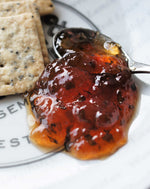 apple and chilli jelly with poppy linseed crackers