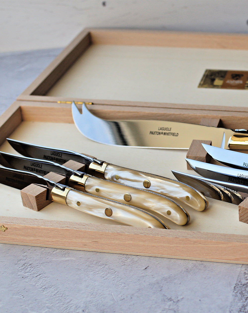 close up 7 piece pearlescent cheese knife set