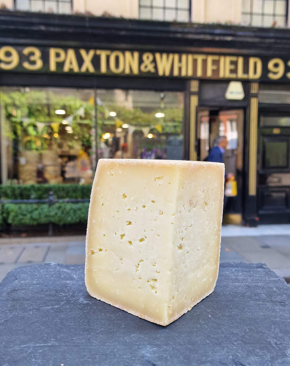 cullum cheese shot outside paxton and whitfield shop