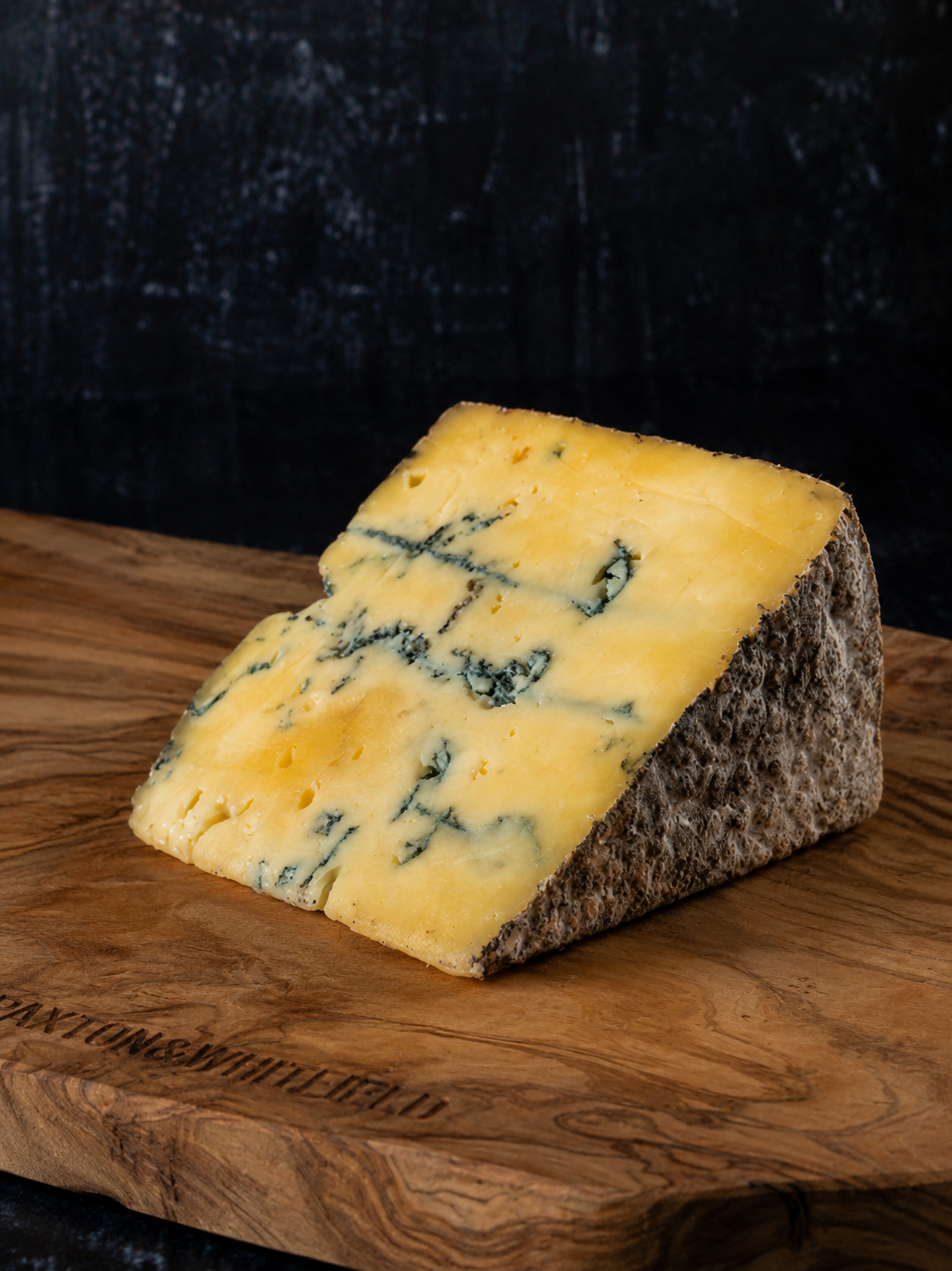 blue cheese on a wooden board
