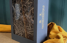 Luxury grey hamper box with Paxton & Whitfield embossed in gold