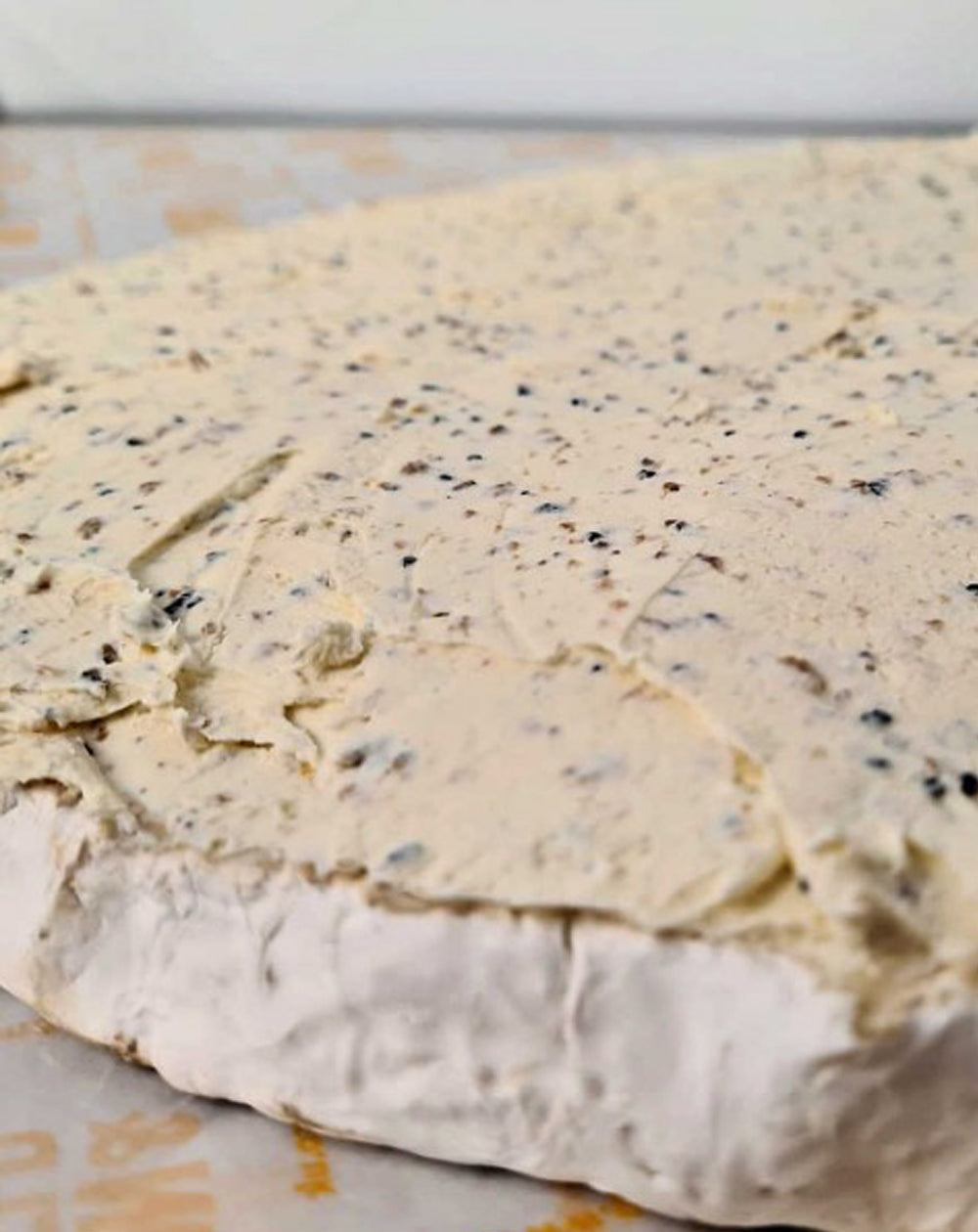 whole hand truffled brie de meaux